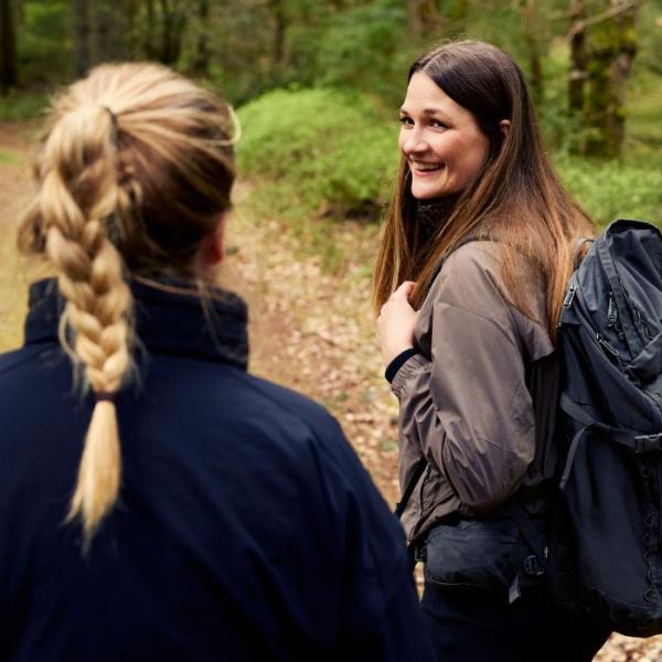 Two people are hiking along Hærvejen