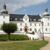 Engelsholm Castle by the moat on a summer day