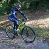 A person on a mountain bike in Nørreskoven Forest in Vejle