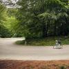 Cyclist cycle in the hairpin bend at Munkebjerg