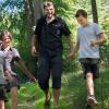 Family on a trip to the Munkebjerg Forest on a summer day