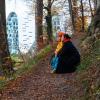 Mother and child on a walk in Nørreskoven in Vejle in autumn with a view of Bølgen and the waterfront